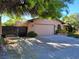 View of the two-car garage and gated entry at 5050 Grandview Dr, Las Vegas, NV 89120