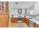 Updated kitchen with stainless appliances, two-tone cabinets, white marble countertop, and stylish backsplash at 5050 Grandview Dr, Las Vegas, NV 89120