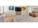 Bright living room with wood-look floors and an adjacent kitchen at 5050 Grandview Dr, Las Vegas, NV 89120