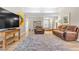 Spacious living room with wood-look floors and neutral paint throughout at 5050 Grandview Dr, Las Vegas, NV 89120