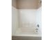 Clean bathroom featuring a white tiled shower and bathtub at 5236 El Prado Heights St, North Las Vegas, NV 89081
