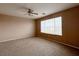 This bedroom features large windows providing views of the neighborhood and lots of natural light at 5236 El Prado Heights St, North Las Vegas, NV 89081
