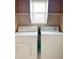 The laundry room features a side-by-side washer and dryer for convenient laundry tasks at 5236 El Prado Heights St, North Las Vegas, NV 89081