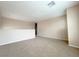 A spacious, carpeted loft area with ample natural light at 5236 El Prado Heights St, North Las Vegas, NV 89081