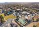 An aerial view of a community featuring a pool, basketball court, and playground for residents at 589 Via Medici, Henderson, NV 89011