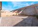 Wide open brick backyard with a view of the desert at 589 Via Medici, Henderson, NV 89011