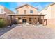 Spacious backyard with large patio area and desert-style landscape at 589 Via Medici, Henderson, NV 89011