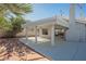 Covered patio featuring a large, partially enclosed space with access to the backyard at 5904 Willowcreek Rd, North Las Vegas, NV 89031