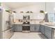 Updated kitchen with stainless steel appliances and plentiful counter space at 6061 Leaping Foal St, North Las Vegas, NV 89081