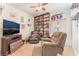 Living room with TV and recliner chair at 6061 Leaping Foal St, North Las Vegas, NV 89081