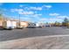 Designated parking area with multiple RVs and truck, providing ample space for residents at 6061 Leaping Foal St, North Las Vegas, NV 89081