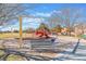Community playground with a colorful play structure, swings, slides, and shaded seating at 6061 Leaping Foal St, North Las Vegas, NV 89081