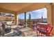 Spacious covered balcony featuring comfortable seating, and scenic views of the surrounding landscape at 64 Strada Principale # 205, Henderson, NV 89011