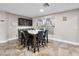 Dining area featuring a table with seating for six, with tile floors at 6627 Bristle Canyon Ave, Las Vegas, NV 89110