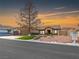 Charming single-story home with desert landscaping and a covered entryway at 6627 Bristle Canyon Ave, Las Vegas, NV 89110