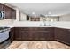 Spacious kitchen with white countertops, and tile floors at 6627 Bristle Canyon Ave, Las Vegas, NV 89110