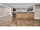 Spacious open floor plan with a breakfast bar and tile flooring at 6627 Bristle Canyon Ave, Las Vegas, NV 89110