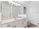 Clean, bright bathroom with a large mirror, vanity, and a shower with tub at 7115 S Durango Dr # 308, Las Vegas, NV 89113