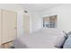 Neutral bedroom with a window overlooking the exterior and a spacious closet at 7115 S Durango Dr # 308, Las Vegas, NV 89113