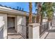 Inviting entrance with desert landscaping and tiled roofs at 7115 S Durango Dr # 308, Las Vegas, NV 89113