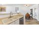 Modern kitchen featuring a stainless steel dishwasher and sink at 7115 S Durango Dr # 308, Las Vegas, NV 89113