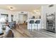 Open layout with dining area, bar seating, and modern decor at 7115 S Durango Dr # 308, Las Vegas, NV 89113