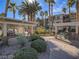 Community featuring well-manicured landscaping, picnic tables, BBQ grills and shade at 7115 S Durango Dr # 313, Las Vegas, NV 89113