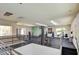 Spacious gym featuring modern exercise machines and ample natural light from large windows at 7115 S Durango Dr # 313, Las Vegas, NV 89113