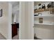 Pantry features wire shelves, cookware and small appliances at 7115 S Durango Dr # 313, Las Vegas, NV 89113