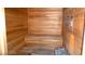 Cozy wooden sauna with built-in benches and a traditional stove at 7115 S Durango Dr # 313, Las Vegas, NV 89113