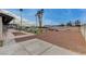 Expansive backyard featuring a putting green, volleyball court, and ample space for entertaining at 723 Spanish Dr, Las Vegas, NV 89110