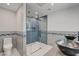 Stylish bathroom with dual vessel sinks, glass walk-in shower, and modern fixtures at 723 Spanish Dr, Las Vegas, NV 89110