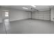 Spacious garage with ample room for parking and storage, plus an attached storage room at 723 Spanish Dr, Las Vegas, NV 89110