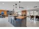 Open kitchen with island sink, granite countertops, and stainless steel appliances at 723 Spanish Dr, Las Vegas, NV 89110