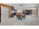 Spacious open-concept living area with dining and kitchen, modern finishes, and luxury vinyl tile at 723 Spanish Dr, Las Vegas, NV 89110