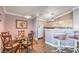 Bright dining area with seamless access to the updated kitchen and breakfast bar, perfect for everyday meals at 7909 Fossil Creek Ln # 202, Las Vegas, NV 89145