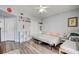 Spacious bedroom featuring vinyl flooring, shelving, and plenty of natural light at 833 Aspen Peak Loop # 712, Henderson, NV 89011