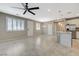 Spacious living room with tile floors, stainless steel appliances and lots of natural light at 8562 Insignia Ave # 102, Las Vegas, NV 89178