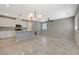 Inviting open floor plan with tile floors, stainless steel appliances and natural light at 8562 Insignia Ave # 102, Las Vegas, NV 89178