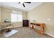 This bedroom is a versatile space that can be used as a home office at 8925 Rio Verde Ave, Las Vegas, NV 89147