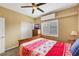Bedroom with carpet, shutters, a ceiling fan, and traditional furnishings at 8925 Rio Verde Ave, Las Vegas, NV 89147