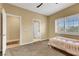 Bedroom with neutral walls, shutters and carpet at 8925 Rio Verde Ave, Las Vegas, NV 89147