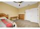 Bedroom with carpet, ceiling fan and minimal furnishings at 8925 Rio Verde Ave, Las Vegas, NV 89147