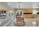 Well-lit dining area situated next to the kitchen and offering backyard access at 8925 Rio Verde Ave, Las Vegas, NV 89147