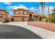 Beautiful two-story home featuring a three-car garage and well-maintained landscaping at 8925 Rio Verde Ave, Las Vegas, NV 89147