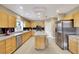 Bright kitchen with stainless appliances, granite countertops, and plenty of storage at 8925 Rio Verde Ave, Las Vegas, NV 89147