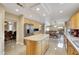 Bright kitchen featuring granite countertops, stainless steel appliances, and an island at 8925 Rio Verde Ave, Las Vegas, NV 89147