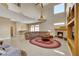 Open living room with fireplace, high ceilings, and stylish decor at 8925 Rio Verde Ave, Las Vegas, NV 89147
