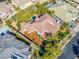 Birds-eye view of home showcasing the roof, driveway, and surrounding landscaping at 9616 Grand Isle Ln, Las Vegas, NV 89144