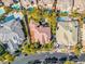 High angle view of home featuring roof, landscaping, and surrounding neighborhood at 9616 Grand Isle Ln, Las Vegas, NV 89144